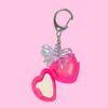 Lindo mini brillo de labios en forma de corazón con llavero que incluye lentes Modelo: C1239